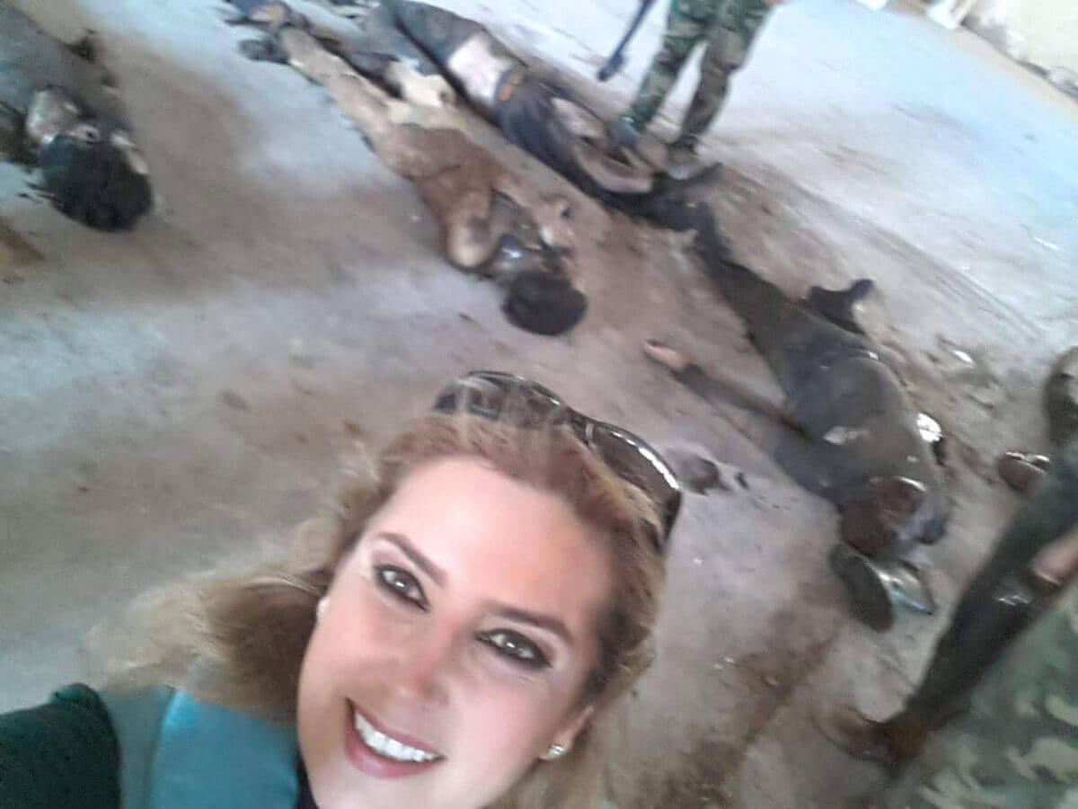 Pro-Assad reporter Kinana Allouche’s infamous selfie with the corpses of Syrian rebels.