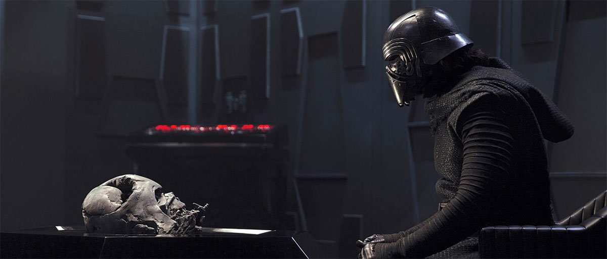 Kylo Ren (Adam Driver) speaking to Darth Vadar's mask, in <em>Star Wars: The Force Awakens</em>. Courtesy Lucasfilm. 
