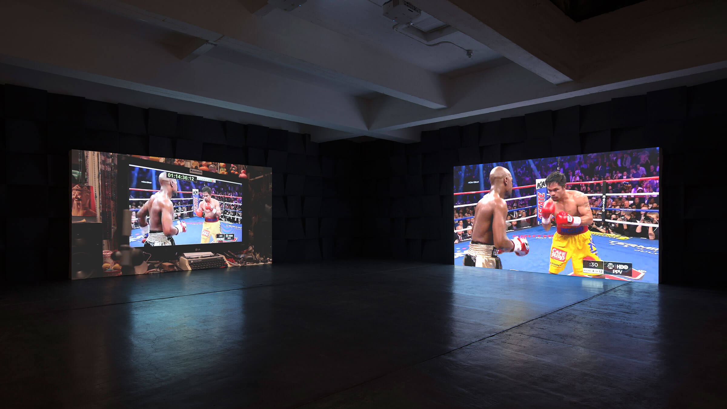 Paul Pfeiffer, <em>Three Figures In A Room</em>, 2015-16 two synced video channels on two projectors, four synced audio channels, Mac Minis  dimensions variable 48 minutes, looped © Paul Pfeiffer.