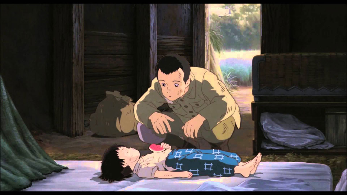 In Isao Takahata’s <em>Grave of the Fireflies</em> (1988), Takahata works with scary precision to illustrate his characters’ bottomless hunger, a condition of living in wartime Japan. In this scene, Seita feeds her a slice of watermelon, which dissolves into her mouth. As he promises to make her rice gruel with eggs, she dies.