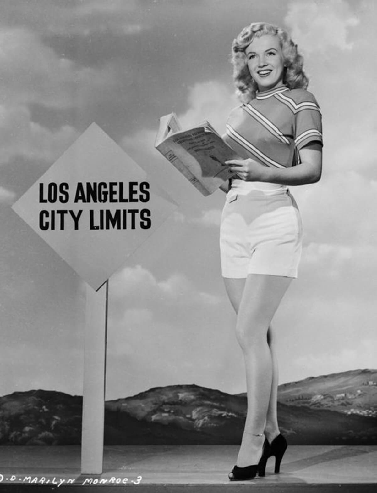 Ed Cronenweth, <em>Marilyn Monroe reading an L.A. telephone directory near the Los Angeles city limits,</em> 1948. 