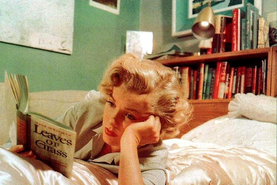 Looking At Photographs Of Marilyn Monroe Reading Affidavit